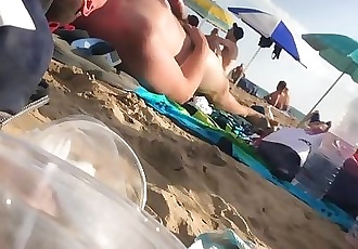 beach spy: cub shows off huge boner on public beach