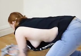 braless redhead teen in too large t-shirt lets you enjoy downblouse view !